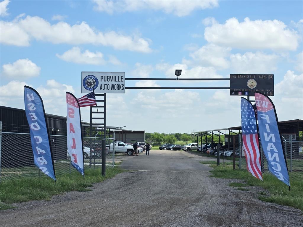 Lot A-2R1 Located at 121 Pistol Rd in Weatherford, this 9.95 acre commercial development is offered as individual lots ranging from ±2.0 to ±3.339 acres. Positioned in unincorporated Parker County just off Veal Station Rd, the property benefits from no zoning, no city entitlements, and minimal development restrictions, making it ideal for industrial outdoor storage, contractor yards, flex industrial, automotive, and service-based users.
The area is experiencing rapid growth driven by residential expansion and increasing demand for small-bay industrial, yard space, and contractor-oriented uses. This offering is well-suited for both owner-users seeking operational flexibility and investors targeting high-demand, low-supply IOS and light industrial assets.

Ownership offers build-to-suit capabilities, allowing customization for office, warehouse, service, or hybrid applications. Rare opportunity to secure flexible-use land in a high-growth corridor with strong long-term upside.

LOT A-2R1 AUTO DEALER - IOS - FLEX INDUSTRIAL
Size: ±2.452 Acres
Investment or Owner-User Opportunity- Automotive - IOS - Flex Industrial
Fully improved industrial outdoor storage site with over 17,000 SF of improvements, ideal for automotive, contractor, or hybrid industrial use.
±5,425 SF climate-controlled showroom-office-restrooms
±9,600 SF + ±2,100 SF covered outdoor storage-display structures 
Overhead doors, spray foam insulation, concrete slabs 
Fenced and gated yard 

Strong fit for auto dealership, equipment sales, fleet storage, contractor yard, or service operations.

Investor upside: Stabilized income potential in a high-demand IOS sector with limited supply.
Owner-user advantage: Immediate functionality with scalable covered storage and office.