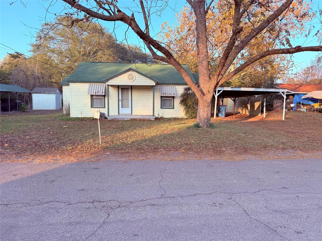 Move-in-ready two bedroom, one bathroom is a must see. Home has been upgraded with new plumbing, electrical, flooring, paint and appliances. Nice bedroom space, utility room, open kitchen to family room area. Two car carport and an oversized backyard and storage building. Located seconds away from downtown historical Winnsboro, 60 miles north of Tyler and 90miles east of Dallas, TX. Come see!