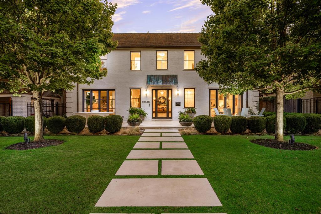 This iconic Lakewood residence masterfully blends historic charm with modern luxury. Completely renovated and thoughtfully expanded in 2016 by the current owners in collaboration with Mark Hoesterey, of SHM Architects, and renowned designer, Chad Dorsey, the home showcases exceptional craftsmanship and high-end construction throughout.

Step inside to discover a modern farmhouse vibe elevated by sophisticated finishes, generous natural light, and an incredible layout designed for both comfort and style. The home offers five spacious bedrooms, five full baths, and two half baths, each appointed with premium materials. The primary suite features vaulted ceilings, hidden study, and heated floors in the master bathroom.

Perfect for entertaining, the property includes an elegant temperature controlled basement wine cellar, a sparkling pool, and a large front porch ideal for relaxing or gathering with friends. A whole-home generator provides peace of mind, while the two-car garage offers convenience and ample storage.

This is a rare opportunity to own a beautifully reimagined historic home on one of Lakewood’s most coveted streets—where classic charm and contemporary elegance converge in every thoughtful detail.