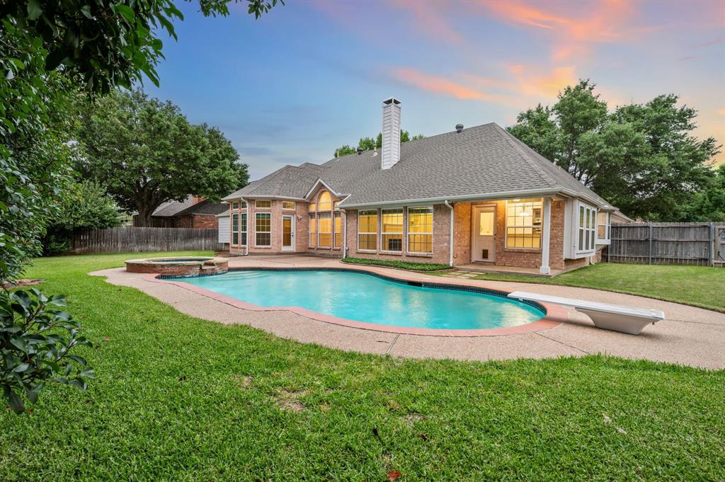 Welcome to this beautifully maintained single-story home in the highly desirable Stone Lakes addition, offering the perfect blend of comfort, functionality, and style. Freshly painted throughout, including all walls, doors, trim, and the garage, this move-in ready home shines with pride of ownership from the moment you walk in. This spacious 4-bedroom, 2.5-bath home features an open and inviting layout designed for both everyday living and entertaining. The kitchen is equipped with stainless steel appliances and flows seamlessly into the main living areas, creating a warm and connected space. Two fireplaces add charm and character, providing cozy gathering spots throughout the home. The private primary suite offers a relaxing retreat, while the thoughtfully designed ADA-accessible shower adds convenience and flexibility. Additional bedrooms are generously sized, offering plenty of space for family, guests, or a home office. Step outside to your own backyard oasis complete with a sparkling pool, perfect for relaxing or hosting during those warm Texas days. A rare 3-car garage provides ample space for parking, storage, or hobbies. Located in a sought-after neighborhood close to parks, shopping, and dining, this home truly has it all. Don’t miss the opportunity to make it yours!