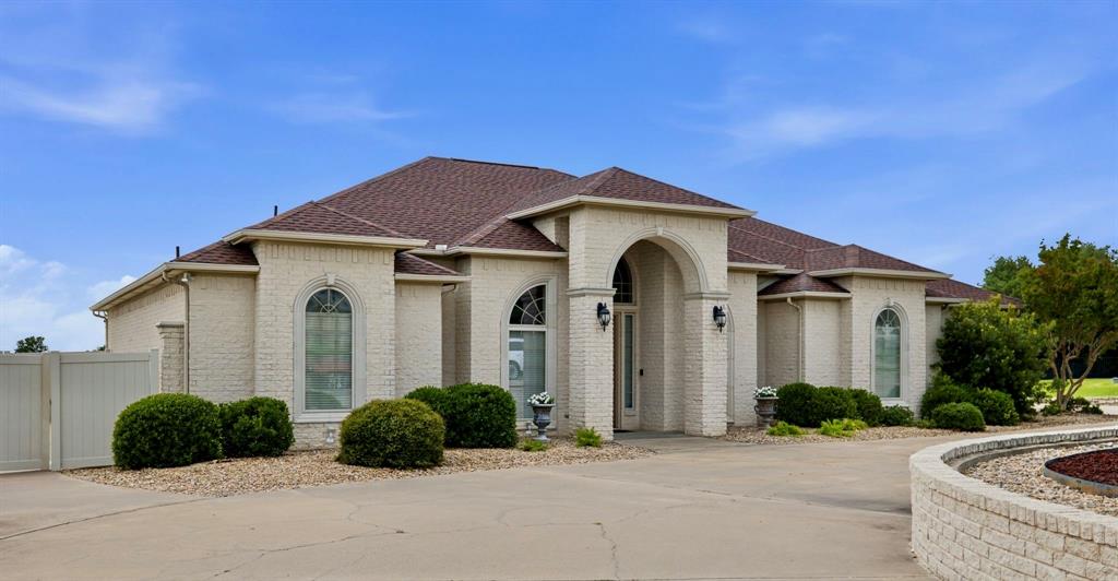 Incredible Custom Lakeview Home with Deeded Boat Slip in the private Bentwater marina providing easy access to lake life and recreation.

Experience stunning lake views and exceptional indoor-outdoor living in this beautifully designed custom home. Built for entertaining, the home features two spacious living areas with expansive windows overlooking the backyard, sparkling pool, and lake beyond.

The chef's kitchen is a true showpiece, offering abundant workspace, premium amenities, and a walk-in pantry large enough to accommodate an additional refrigerator. The thoughtfully designed split-bedroom floor plan provides privacy, while the oversized primary suite showcases a wall of windows, direct backyard access, and breathtaking lake views.

Storage is abundant throughout the home. The massive utility room includes a dedicated holiday storage area, and you'll find more storage space than you could ever need. The oversized two-car garage is complemented by generous air conditioned and heated workshop areas and an additional bathroom, making it ideal for hobbies, projects, or extra functionality.

In June the roof and the primary bedroom area HVAC were replaced.

Located on the desirable Fort Worth side of Granbury, you'll enjoy convenient access to H-E-B, dining, shopping, and the Historic Granbury Square—all just minutes away.  

This is a rare opportunity to enjoy luxury, space, storage, and lake living all in one exceptional property.  

Information is deemed reliable, but buyer should verify all information provided, including dimensions, shools, HOA document and restrictions.