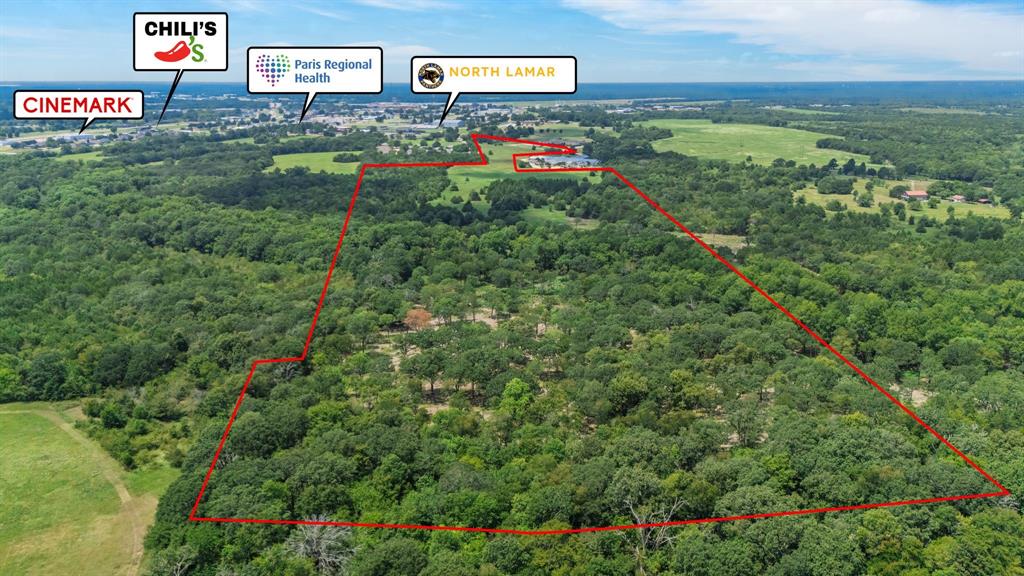 Discover the perfect blend of commercial potential, residential opportunity, and outdoor recreation with this exceptional ag-exempt 83-acre tract in Paris, Texas. Conveniently located in a growing area, this expansive property offers the versatility and seclusion ideal for a variety of uses, whether you’re seeking to develop, invest, or enjoy a private retreat. This property is in a great location close to Paris Regional Medical Center and North Lamar ISD, along with everything else needed to support your development.  The entire property is within the City Limits of Paris Texas, so you can develop it into high density residential lots while the mature trees at the rear allows for the privacy that someone might want as well. This property could be a great investment to add to your real estate portfolio!