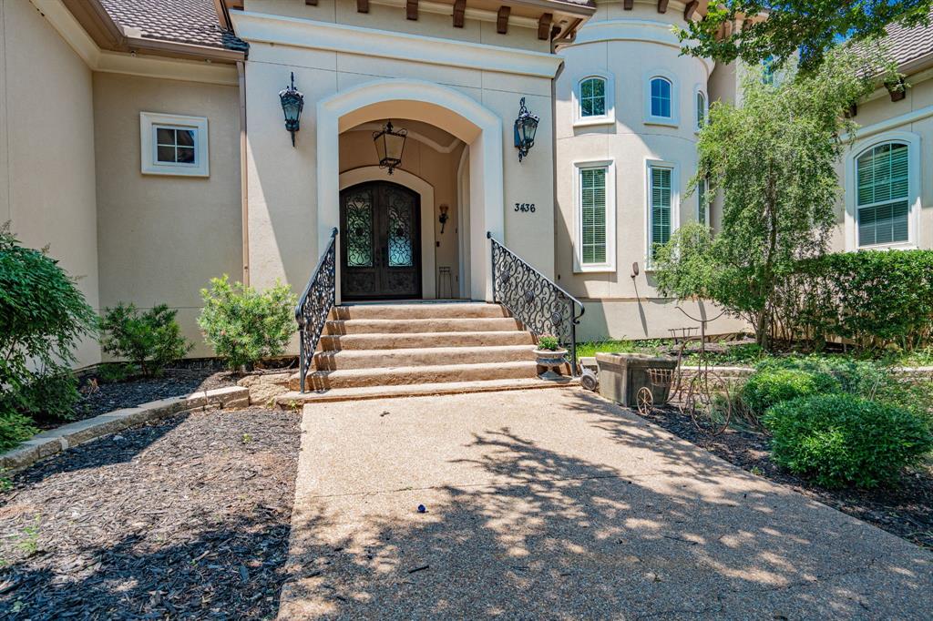 Extraordinary opportunity awaits to own this breathtaking 18-acre private gated estate in Arlington. This exquisite Mediterranean-style home boasts 3 levels, 5 bedrooms, 7 baths, 3 living rooms, 2 dining rooms, 4 fireplaces. The luxurious primary suite with a sitting area, fireplace, veranda access, 2 expansive closets, and a lavish bathroom. The office showcases a fireplace, and custom filing systems. The spacious kitchen offers an island, breakfast bar, built-in refrigerator, double gas oven, cooktop, and a generous walk-in pantry. Step out onto the veranda and take in the serene views overlooking the greenbelt and Rush Creek, complete with a cozy fireplace. The property includes a game room with a separate kitchen, a resort-style indoor heated pool with a hot tub, waterfall, slide, and full cinematic theater. The third floor adds to the allure with 4 bonus rooms. Added charm to this remarkable property are the barn, arena, 5 fenced paddocks, guest house, 2 pavilions, and tack house.