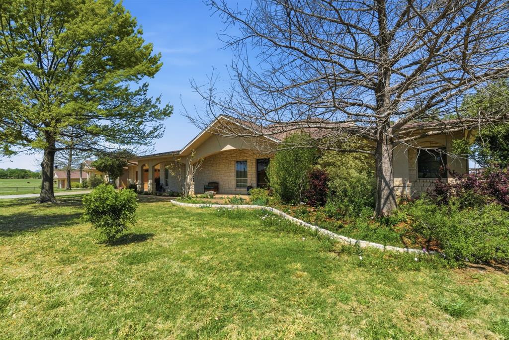 Tucked away in the quiet countryside of Springtown, 3601 Springfield Rd offers the kind of privacy and elbow room that’s getting harder and harder to find, yet it’s just 21 miles from Fort Worth, giving you the perfect balance of country living with easy city access. With over 4,000 square feet of total living space between the main home and guest house, this property is ideal for multi-generational living, hosting guests, or creating a private retreat with room to spread out.
The main home sits over 600 feet from the nearest neighbor, delivering true seclusion and peaceful views in every direction. Step outside and you’ll find a swimming pool ready for Texas summers, plus a thoughtfully laid-out property designed for both lifestyle and function.
For the ag minded or hobby farmer, there’s a barn with three temporary stalls for livestock, a chicken coop, and a storage shed, making it easy to support animals, equipment, or weekend projects. A pond adds both charm and utility to the land, creating a scenic focal point and a great place to unwind.
Whether you’re looking for a private country homestead, a place to entertain, or a property that blends comfortable living with rural amenities, this one checks all the boxes space, privacy, and versatility, all just a short drive from Fort Worth.