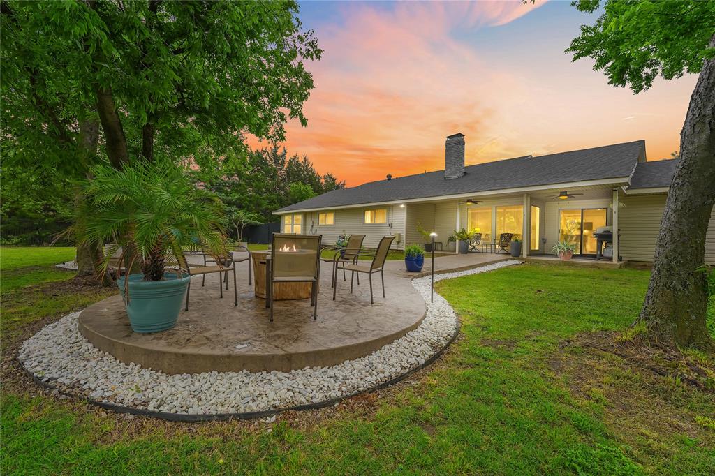 Welcome to 4501 Toler Rd, Rowlett, TX — a rare 4-bedroom, 2-bath home on approximately 1.02 acres that was made for entertaining. With high ceilings throughout, large updated windows, and a layout that feels open, bright, and inviting, this single-story home offers the perfect blend of comfort and functionality.

Outside is where this property really turns heads: a massive custom patio, expansive covered front and back porches, and a partially fenced yard with 6-foot iron fencing create an ideal setting for hosting friends, celebrating milestones, or simply enjoying the extra space and privacy that’s so hard to find in Rowlett. From casual evenings outdoors to larger gatherings, this home was designed to bring people together.

For buyers searching for a home with acreage in Rowlett, large lot homes near Dallas, or a property with standout outdoor entertaining space, 4501 Toler Rd checks all the boxes.
**Open House Sunday April 26th 1-3**