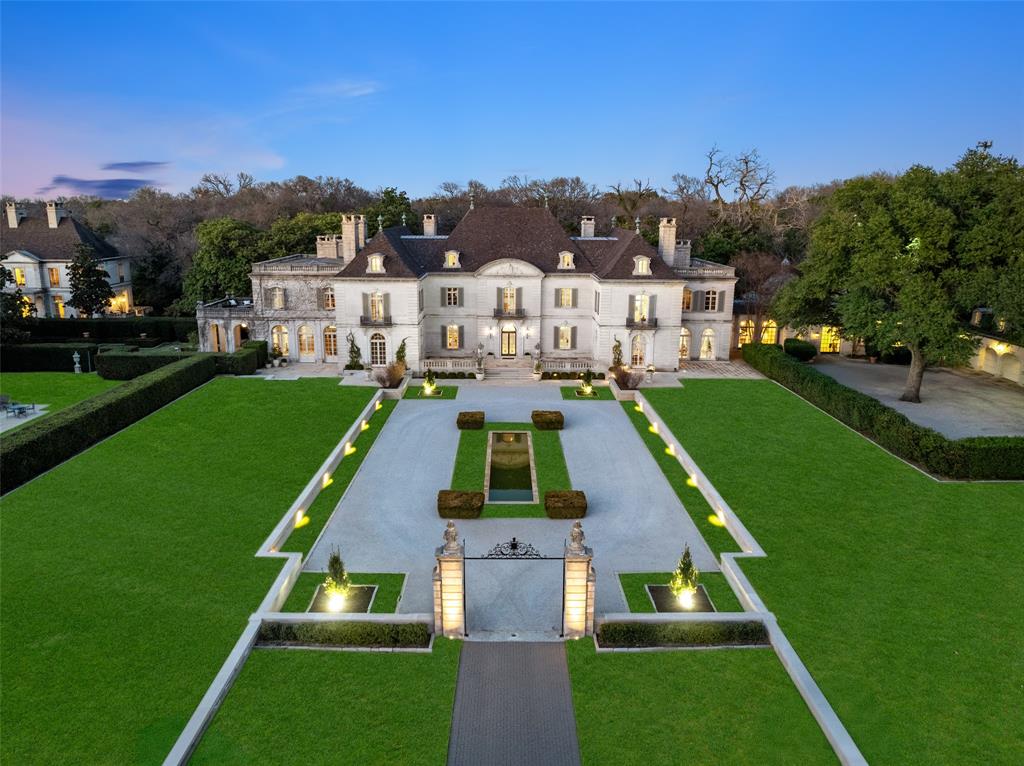 A symbol of an era, a setting for the future — Dallas’ most legendary estate is ready for its next chapter. Since 1938, the prestigious Crespi Estate has hosted presidents, dignitaries and icons like Coco Chanel and the Duke and Duchess of Windsor. Designed by Swiss architect Maurice Fatio for Italian count Pio Crespi, this palatial French-style chateau blends intimacy with grandeur across more than 27,000 square feet. With 10 bedrooms, 12.5 baths, a ballroom, an Art Deco bar, two wine cellars, a conservatory, a library imported from France, a media room and a 3,000-square-foot primary suite, luxury is everywhere. Enhancements by noted architect Peter Marino include an elegant 3,300-plus-square-foot guesthouse and a remarkable 4,800-plus-square-foot entertainment pavilion with a 19-seat theatre. The three adjacent lots are included in the listing, making a total of 15.687 acres. The grounds feature a swimming pool and spa, tennis and bocce ball courts, gardens, greenhouses, a creek and a heliport. A rare opportunity to own a Dallas masterpiece.