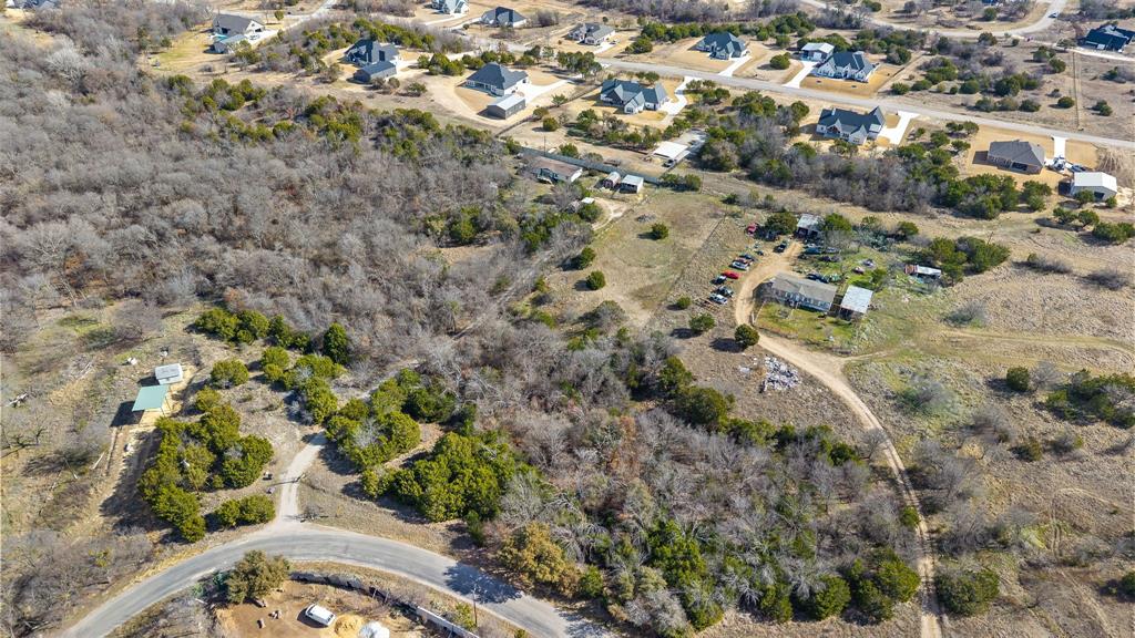 Discover the freedom to create your dream property on this beautiful 1.5-acre tract of raw, unimproved land. Offering a true blank slate, this spacious parcel provides endless possibilities to design and build exactly what you envision—whether it’s a custom home, barndominium, workshop, or private retreat.

This property is located just south of Springtown and North or Willow Park Texas - almost center between the two cities. Enjoy the peace and privacy of wide-open space while still being conveniently located near everyday amenities including shopping, dining, schools, medical facilities, and major roadways for easy commuting. With room to spread out, you’ll have the flexibility to add a pool, shop, guest house, or outdoor living spaces tailored to your lifestyle.

** All information deemed reliable, but buyer and buyer's agent to verify all details, including schools and measurements.**

Limited existing structures mean no limitations—bring your builder, choose your floor plan, and create a property that fits your needs from the ground up. If you’ve been waiting for the perfect opportunity to build without compromise, this 1.5-acre homesite is ready for your vision.

All information deemed reliable, but buyer and buyer's agent to verify.