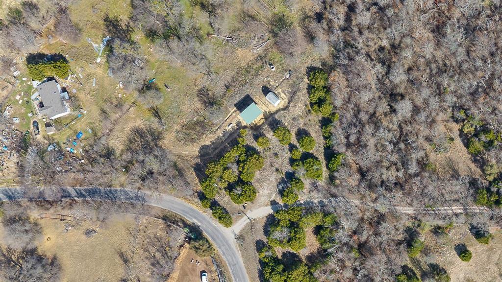 Discover the freedom to create your dream property on this beautiful 1.5-acre tract of raw, unimproved land. Offering a true blank slate, this spacious parcel provides endless possibilities to design and build exactly what you envision—whether it’s a custom home, barndominium, workshop, or private retreat.

This property is located just south of Springtown and North or Willow Park Texas - almost center between the two cities. Enjoy the peace and privacy of wide-open space while still being conveniently located near everyday amenities including shopping, dining, schools, medical facilities, and major roadways for easy commuting. With room to spread out, you’ll have the flexibility to add a pool, shop, guest house, or outdoor living spaces tailored to your lifestyle.

** All information deemed reliable, but buyer and buyer's agent to verify all details, including schools and measurements.**

Limited existing structures mean no limitations—bring your builder, choose your floor plan, and create a property that fits your needs from the ground up. If you’ve been waiting for the perfect opportunity to build without compromise, this 1.5-acre homesite is ready for your vision.

All information deemed reliable, but buyer and buyer's agent to verify.