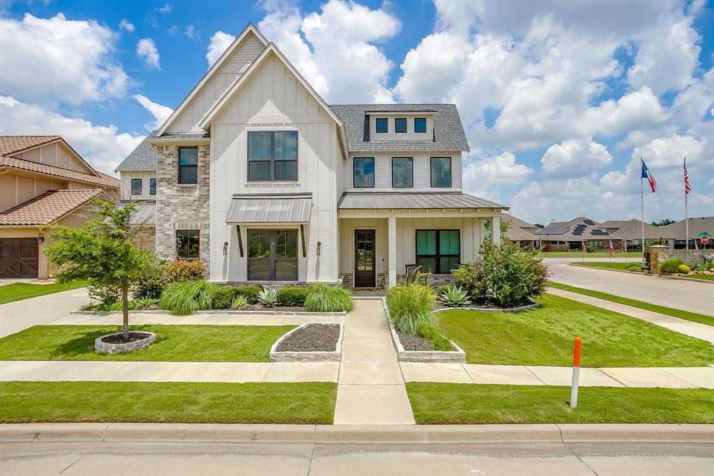 Experience elevated living in this exceptional former Windmiller model home located in the sought-after Hidden Vistas community. Perfectly positioned on a spacious corner lot, this stunning residence showcases upscale finishes, thoughtful design, and an abundance of space for both everyday living and entertaining.  The heart of the home features a chef-inspired kitchen complete with quartz countertops, an oversized island with seating, designer lighting, and seamless flow into the expansive living and dining areas. Large windows throughout fill the home with natural light, creating a bright and inviting atmosphere.  Step outside to your private backyard retreat where a covered patio, built-in grill, and cozy fire pit set the stage for unforgettable gatherings with family and friends. The three-car garage provides ample room for vehicles, storage, and hobbies.  Upstairs offers a unique second living environment, featuring a versatile loft with library and tech space, a spacious game room, an additional living area with a wet bar, and two generously sized bedrooms, each accompanied by a full bath. Every detail has been carefully curated to deliver comfort, functionality, and style.  This one of a kind home blends luxury, flexibility, and exceptional craftsmanship, making it an incredible opportunity in one of the area's most desirable neighborhoods.