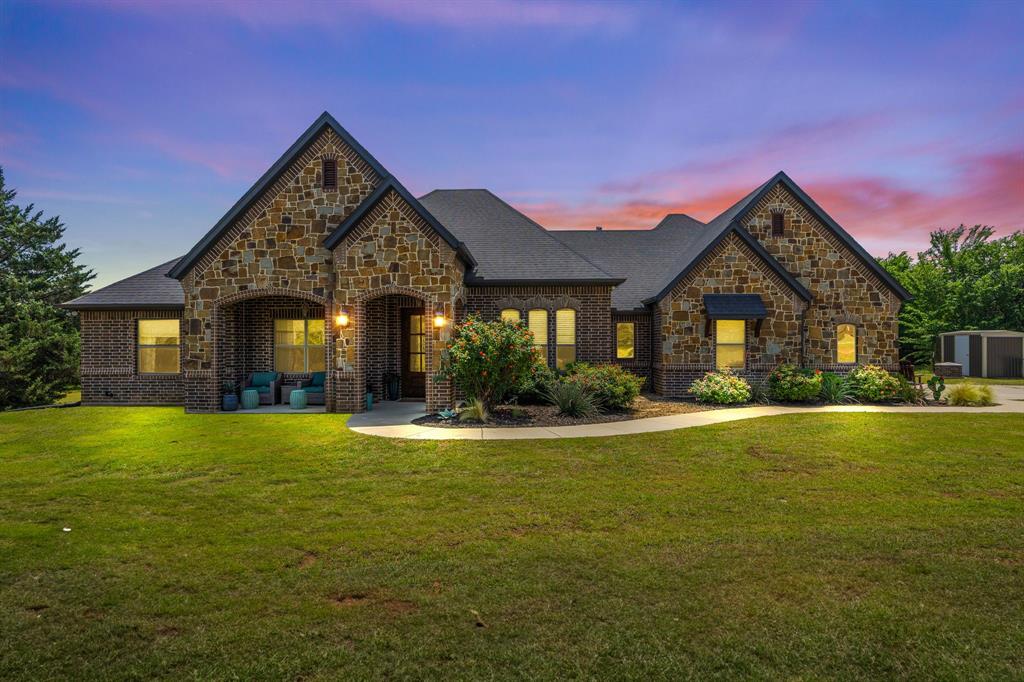 You don't want to miss this one! The most pristine custom built home on homesteaded 10.31, ag exempt acres in between Boyd and Decatur! Luxury living on your very own mini ranch! The home is beautiful with tasteful custom finishes throughout, 4 bedrooms, 2.5 baths and a office. The living room has vaulted ceilings with beautiful wood beams that match tastefully with the hand scraped wood flooring & the gas fireplace! Great place to get cozy on those cold winter nights! The kitchen has granite countertops, stainless steel appliances, gas cooktop with a pot filler! The Primary bedroom is large with an En-suite bath! The primary bath will make you never want to leave it, it has separate vanities, large freestanding tub and an extra large walk through shower, plus a walk in closet! Split floorplan with the other three bedrooms on the opposite side of the house. Large windows throughout for natural light!  The back porch is covered with a patio extension, giving you plenty of room for entertaining, plus it is already plumbed for an outdoor kitchen! The backyard is fenced with pipe and no climb wire, also has a fire pit! The acreage has great sandy loam soil, a pond, is fully fenced and has a mix of cedar and oak trees throughout, offering peace, seclusion and privacy on all sides, which is hard to find! Watch the deer come up to graze, all while just sitting on your back porch! There is a loafing shed for livestock and a metal structure for RV or boat parking. New 2026 updates include new carpet in bedrooms, new paint and stain on the exterior of home, and more! Call to view or to get more information today!
