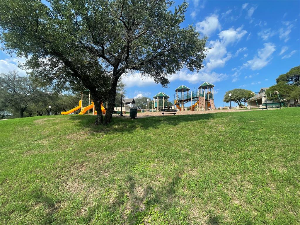 Golf course lot with over .6 acres! This tow lot package is the perfect building site in White Bluff. Located near the New Course this lot is centrally located to all of the amenties White Bluff has to offer. White Bluff is a resort community that features two golf courses, swimming pools, a marina and so  much more. This lot is located in a gated community with a onsite guard. You must be accompanied by a real estate agent to view the lot.