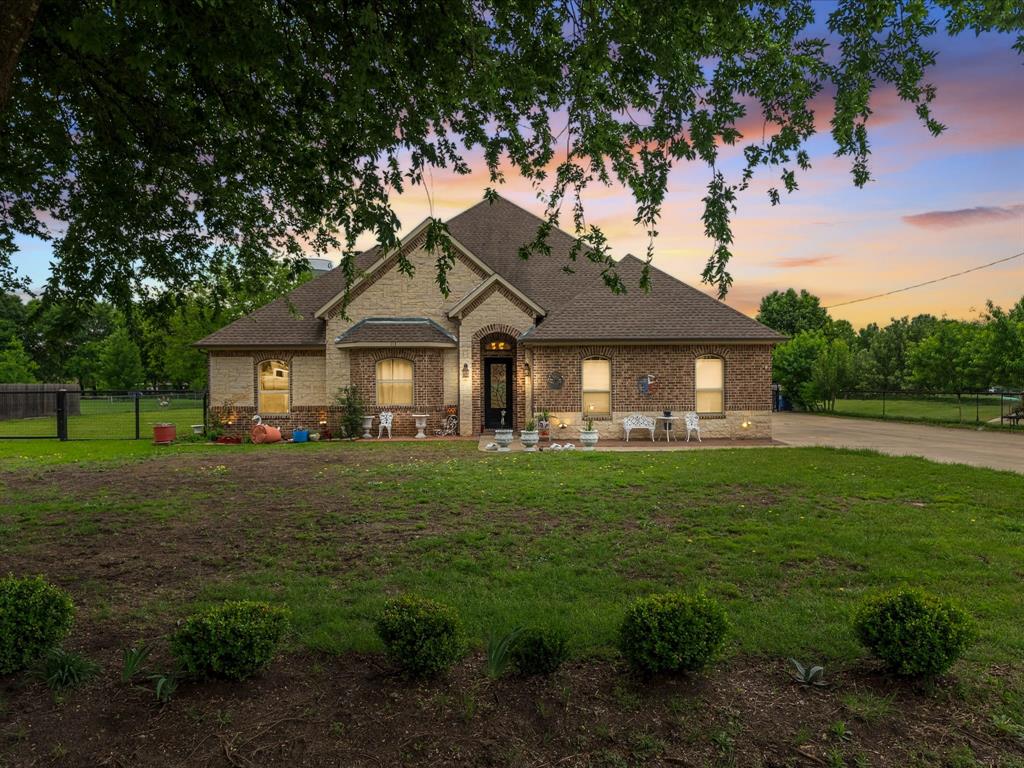 Welcome to 113 Silverwood Drive a beautifully maintained custom home nestled on nearly a full acre in the highly sought-after Midlothian ISD. Offering the perfect blend of space, privacy, and thoughtful design, this one-story residence delivers both comfort and functionality in a serene setting.
Situated on an expansive 0.93-acre lot, this 4-bedroom, 3-bath home has been exceptionally cared for and feels truly move-in ready. Inside, you’re greeted by high ceilings and an open-concept layout that seamlessly connects the main living spaces, creating an inviting atmosphere ideal for both everyday living and entertaining.
The spacious living room features a stunning brick fireplace as its focal point, while the kitchen is designed to impress with custom cabinetry, granite countertops, stainless steel appliances, and ample workspace. The flexible floor plan includes a dedicated study or optional fourth bedroom, perfect for a home office, guest suite, or additional living space.
The private primary suite offers a relaxing retreat with a large walk-in closet and a well-appointed ensuite bath featuring a tiled shower and generous layout. Secondary bedrooms are spacious and thoughtfully positioned, providing comfort and privacy for family or guests.
Step outside to enjoy the covered patio overlooking the expansive backyard offering endless possibilities for outdoor living, entertaining, or even adding a pool, shop, or additional structures.
Additional highlights include an oversized 2-car garage, energy-efficient construction, and insulated metal-wrapped ductwork for enhanced performance and durability.
With its rare combination of land, condition, and custom features, this home presents a unique opportunity to enjoy peaceful country-style living while remaining conveniently close to city amenities.