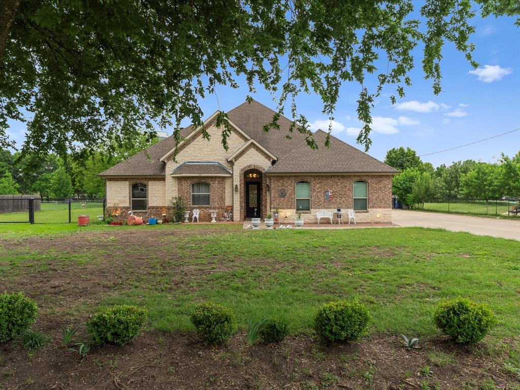 Welcome to 113 Silverwood Drive a beautifully maintained custom home nestled on nearly a full acre in the highly sought-after Midlothian ISD. Offering the perfect blend of space, privacy, and thoughtful design, this one-story residence delivers both comfort and functionality in a serene setting.
Situated on an expansive 0.93-acre lot, this 4-bedroom, 3-bath home has been exceptionally cared for and feels truly move-in ready. Inside, you’re greeted by high ceilings and an open-concept layout that seamlessly connects the main living spaces, creating an inviting atmosphere ideal for both everyday living and entertaining.
The spacious living room features a stunning brick fireplace as its focal point, while the kitchen is designed to impress with custom cabinetry, granite countertops, stainless steel appliances, and ample workspace. The flexible floor plan includes a dedicated study or optional fourth bedroom, perfect for a home office, guest suite, or additional living space.
The private primary suite offers a relaxing retreat with a large walk-in closet and a well-appointed ensuite bath featuring a tiled shower and generous layout. Secondary bedrooms are spacious and thoughtfully positioned, providing comfort and privacy for family or guests.
Step outside to enjoy the covered patio overlooking the expansive backyard offering endless possibilities for outdoor living, entertaining, or even adding a pool, shop, or additional structures.
Additional highlights include an oversized 2-car garage, energy-efficient construction, and insulated metal-wrapped ductwork for enhanced performance and durability.
With its rare combination of land, condition, and custom features, this home presents a unique opportunity to enjoy peaceful country-style living while remaining conveniently close to city amenities.