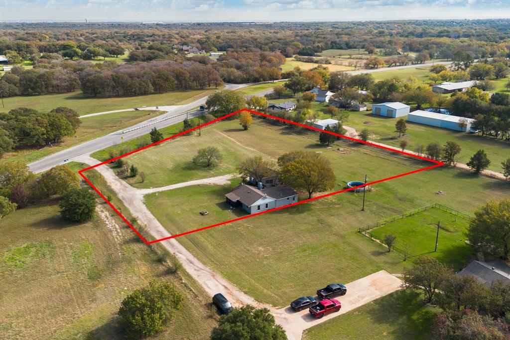 If you are looking for a spacious and scenic property with endless potential, this is the one for you! This listing offers 2.63 ACRES of beautiful land with mature trees. The home on the property is being sold AS-IS and is ready for your personal touch. The additional bonus room with full bath will give the new owner a variety of options to fill this space.  You will enjoy the privacy and tranquility of this location, while being close to amenities and services.