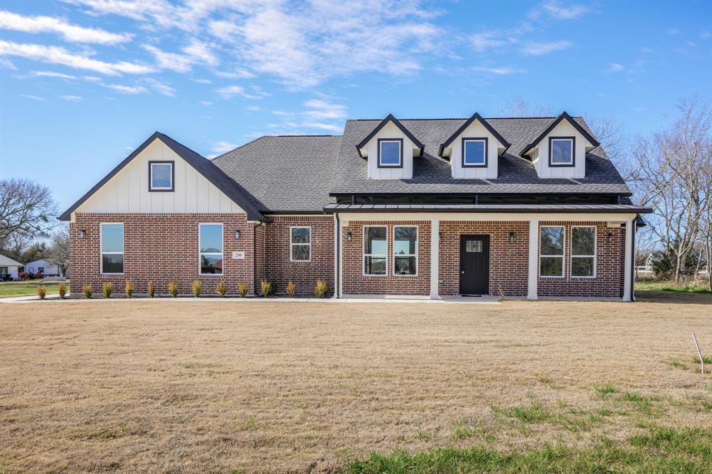 This 4-bedroom, 3-bathroom home offers modern living in a serene country setting. Situated on a 1-acre lot in McIlrath Estates, this residence features an open-concept floor plan with 2,292 sq ft of living space. The spacious kitchen seamlessly flows into the living and dining areas, ideal for both daily living and entertaining. The primary suite includes a private bath and generous closet space. Additional amenities include a two-car garage, covered patio, and a cozy fireplace in the living room. Enjoy the tranquility of rural living while being conveniently located near local amenities.
