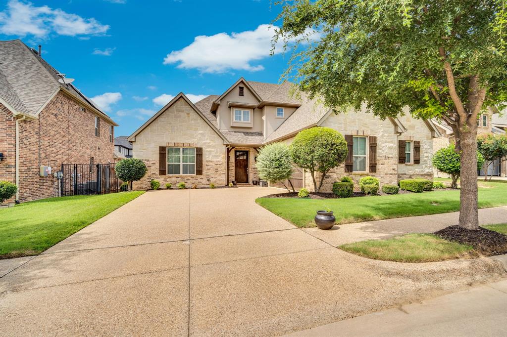 A rare opportunity to own in one of Arlington's most exclusive gated communities. Tuscany Lakes is a boutique enclave of just 40 fully custom homes, each one uniquely designed and built to stand on its own. With homes ranging from nearly two decades old to just about a year old, this community offers a beautiful variety of architecture and character that you simply cannot find anywhere else.

This well-maintained custom home features an open floor plan with an oversized island and beautiful hardwood floors and tile throughout the living room, kitchen, breakfast area, and dining room.

The thoughtfully designed floor plan places the master suite and an additional bedroom on the main level along with two full baths. The clean, elegant kitchen is a chef's dream with abundant cabinetry, a large gas range, stainless steel appliances, and granite countertops. The master suite is enhanced with dual vanities, a garden tub, a huge walk in closet, and a separate shower. Step outside to your covered patio complete with ceiling fans, perfect for relaxing evenings outdoors.

Upstairs you will find a spacious game room and two generously sized bedrooms, giving the whole family room to spread out and unwind.

The location is truly unbeatable. You are just minutes from Lake Arlington, where you can enjoy a peaceful evening of fishing right in your own backyard of town. Arlington Highlands with premier shopping and fine dining is about ten minutes away, and downtown Fort Worth is just seventeen minutes from your front door.

Opportunities like this in Tuscany Lakes do not come around often. When one of these 40 homes hits the market, it never lasts long.