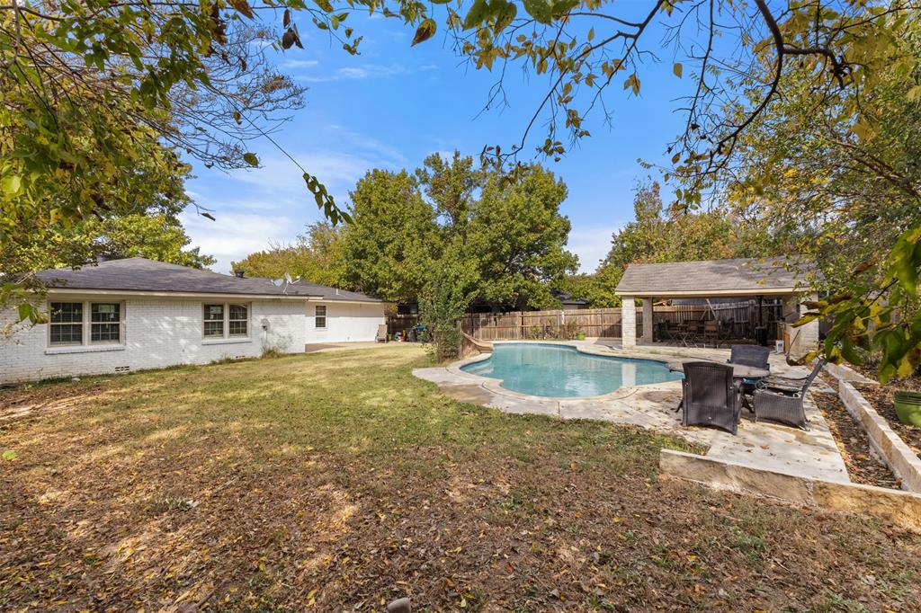 Beautifully updated and ideally located, this Fort Worth home offers the perfect blend of modern comfort and outdoor luxury. This property offers an updated interior with modern finishes and functional layout designed for comfortable living. The spacious backyard includes a covered outdoor kitchen, patio area, and a pool, providing an excellent set up for outdoor use throughout the year. 
Situated just minutes from Hulen Mall, Texas Christian University TCU, and surrounded by dining and shopping, this home also provides quick and convenient access to I-20, making your daily commute a breeze.