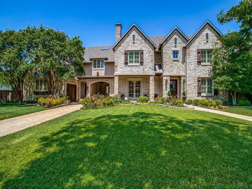 This luxury pier and beam custom home offers much desired double lot, 3 car plus porte cochere in HPISD. Home showcases an open living concept in the remodeled kitchen & living area with cozy FP, & walk up wet bar. Kitchen equipped with Dacor appliances includes large built-in frig & spacious island designed for entertaining. Private office with built-ins. Upstairs offers: Perfect Owners retreat with luxurious spa like bath & separate custom dream closets. 4 secondary beds with ensuite baths, youth lounge, wet bar-snack kitchen, powder bath & exercise room. Storage closets. Additional living space with separate entry offers living room, game, kitchen, laundry, full bath with pool access & staircase to upstairs bedroom with ensuite bath. Unapparelled outdoor living with two expansive patio areas one with fireplace & and outdoor kitchen. Pool, spa & yard for entertainment. This classic home was build by Craft Barnett & recent remodeling provided by Paul Zuch with Capital Renovations.