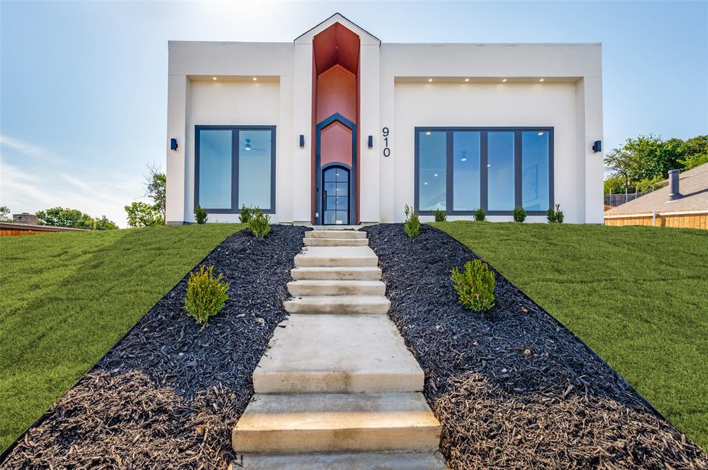 **Now Available*** – Luxury Living in Dallas!** This stunning 3-bedroom, 2.5-bath residence offers approximately 2,100 sq. ft. of thoughtfully designed living space with a timeless contemporary aesthetic. The open-concept floor plan features luxury vinyl plank flooring throughout, a designer kitchen with quartz countertops, oversized island sink, pot filler, and a stylish wet bar. Retreat to the spa-inspired primary suite, while elegant secondary baths showcase custom tile work and wall-mounted faucets. Architectural arches, a striking wrought iron front door, and a rear-entry garage complete this beautifully crafted home. A perfect blend of sophistication, comfort, and modern luxury.