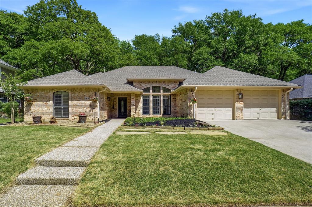 Beautiful one-story ranch style home in the heart of the Metroplex with quick access to DFW Airport. This 4-bed, 3-bath split-bedroom floor plan is ideal for generational living, offering a private bedroom and full bath on its own side of the home. Two living areas and two dining areas provide flexible space for cohabitating households. The updated kitchen features granite countertops, double ovens and breakfast bar, wood-look tile floors throughout area are neat and easy to care for. A wall of windows fills the home with natural light and offers peaceful views of the trees.
Enjoy a spacious deck and iron-fenced yard backing to a quiet greenbelt with neighbors tucked away in the woods. Plantation shutters, a cozy gas log fireplace and ceiling fans make a comfort retreat. The lovely small, secluded neighborhood of 29 homes feels private while still being close to restaurants, shopping. PLUS no HOA fees will save you a bundle. Roof Approximately 4 years old. HVAC 2024. New deck and Iron fence installed 2024. Seller does not have a current survey buyer must purchase their own.

---