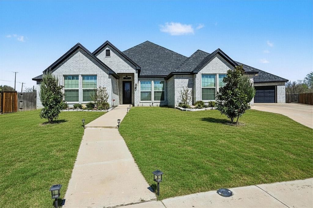 Welcome to this impressive 4,284 sq ft residence in Spring Ranch Estates, Haslet, offering rare space, flexibility, and true MULTIGENERATIONAL LIVING with a fully attached 1 bedroom ADU, perfect for in-law living, extended family, or private guest quarters. The ADU features its own front entry plus direct access from the single car garage, creating both independence and connection under one roof.

The ADU is thoughtfully designed with low maintenance flooring throughout, carpeted bedrooms, and a spacious primary suite featuring tray ceilings and a luxurious ensuite bath with dual vanities, a soaking tub, and separate shower. The open kitchen includes an island with breakfast bar and pantry, while the comfortable living area features a fireplace, making it feel like a complete home of its own.

The main home offers 3 bedrooms and 2.5 baths with an open, flowing layout designed for comfort and entertaining. Highlights include a chef-style kitchen with large island and breakfast bar, formal dining room, spacious living area with tray ceilings and fireplace, and a primary suite with dual vanities, soaking tub, and separate shower. A generously sized laundry room and half bath adds conveniences to both the main dwelling and the ADU. 

Outdoor living shines with a fenced backyard, covered patio, and show stopping IN-GROUND POOL with expansive patio space for entertaining! The 3 car garage provides ample parking and storage plus side green space adds privacy and flexibility.

Located in Northwest ISD, this home offers highly rated schools along with the quiet, spacious feel of Spring Ranch Estates, while still being minutes from shopping, dining, and Fort Worth access.

Don’t miss this rare opportunity, schedule your private tour today. Homes with this level of space, versatility, and dual living potential don’t last long!

Discounted rate options and no lender fee future refinancing may be available for qualified buyers of this home.