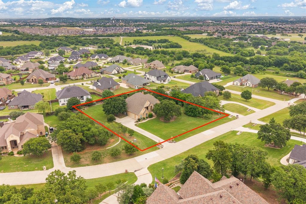 Welcome to 608 Elm Hill Blvd in Burleson Tx! This stunning home in Prairie Timber Estates sits on a full acre featuring beautiful mature trees. Offering 3 bedrooms and 2.5 baths, designed with comfort and flexibility in mind. Designated office, flex space or even a 4th bedroom. The spacious kitchen flows beautifully into the dining room, creating an ideal setup for everyday living and entertaining. The large kitchen stands out with extra cabinetry for abundant storage, plus a spacious island featuring an additional prep sink, making meal prep and entertaining effortless. Large utility room with direct access into the master closet, adding convenience and thoughtful design to the layout. Step outside to a welcoming patio with a generous sitting area and cozy fireplace, ideal for relaxing evenings. The backyard also includes a lovely pergola and an additional paved walking path with its own sitting area, creating multiple spots to unwind and enjoy the outdoors. The property also includes a 3-car garage, providing plenty of room for vehicles, storage, or hobbies. Don’t miss the chance to experience this beautiful Prairie Timber Estates listing. With this beautiful home the sellers are offering to leave the refrigerator and multiple furniture items. Please get with listing agent!