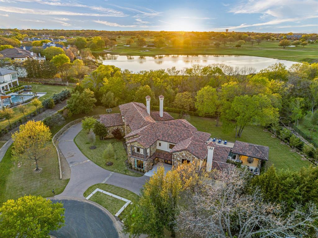 Presenting an exquisite custom residence nestled within the prestigious Vaquero Club, this remarkable property spans over an acre, discreetly positioned behind a lush greenbelt. Enjoy the privilege of homeownership and BYPASS the lengthy waitlist for Vaquero golf club membership, as the sellers are offering their coveted golf membership. The first floor has been tastefully remodeled, boasting designer accents and premium finishes throughout. Delight in a gourmet kitchen equipped with top-of-the-line Sub-Zero and Wolf appliances. The master retreat features dual vanities, a luxurious soaking tub, and a custom-designed walk-in closet with abundant cabinetry and stackable washer&dryer. Upstairs, discover an expansive game room with a bar and balcony, an exercise room, a media room, and three additional bedrooms. Outside, revel in the outdoor oasis featuring lush landscaping, privacy, a sparkling pool and spa, and a covered cabana with generous seating and a fire pit.