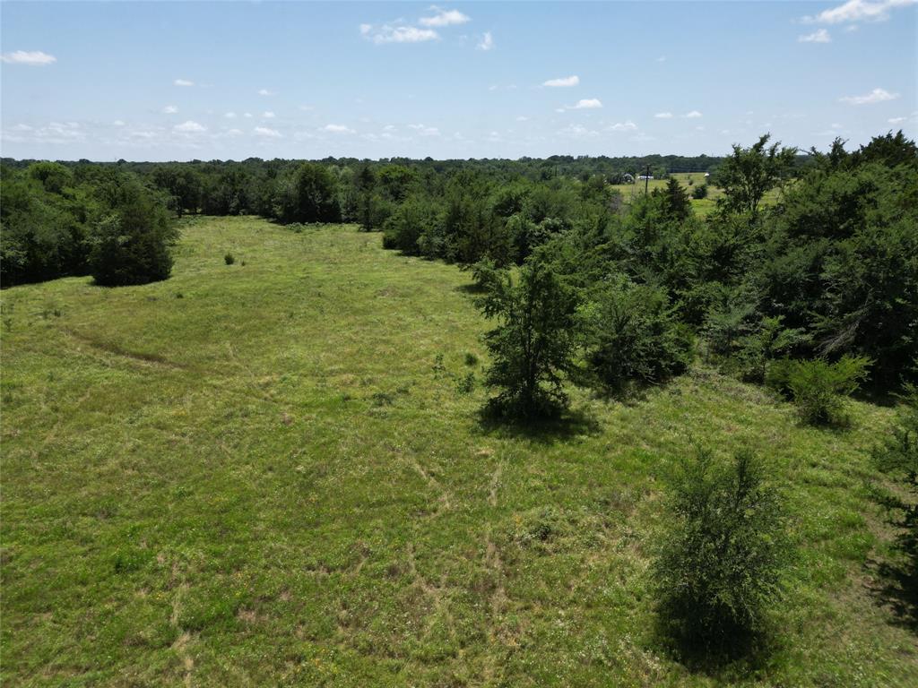 Tucked away in the peaceful countryside of Sulphur Springs, this beautiful 3-acre tract offers the perfect blend of seclusion and convenience. Located within the desirable North Hopkins ISD, this partially wooded property provides a serene, private setting ideal for building your future dream home. Enjoy the quiet atmosphere and natural surroundings while still being less than 20 minutes from downtown Sulphur Springs, where you'll find shopping, dining, and entertainment. Whether you're looking for a weekend retreat or a full-time residence, this property presents a unique opportunity to own a piece of East Texas charm. Don’t miss out on this rare find—schedule your showing today!