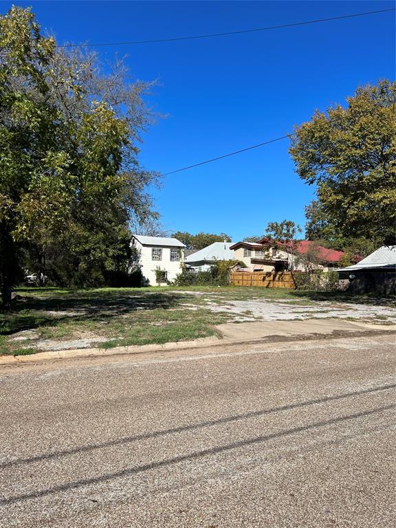 Zoned COMMERCIAL & RESIDENTIAL in the heart of Cleburne blocks from downtown. These are 2 lots offering 0.217 of an acre cleared out ready for development of your choice.  property is zoned Commercial but the NT Overlay allows a single-family residential home to be constructed anywhere in the Overlay is the description from the zoning department of Cleburne. Consult zoning for any concerns