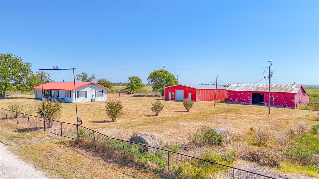 Discover your own slice of rural paradise with this stunning 299(+-)acre property in Coolidge! Perfectly suited for ranching, recreation, or investment, this expansive land offers a unique blend of natural beauty and functional features. A comfortable 3-bedroom, 1-bath house provides a cozy retreat or a perfect base for your farming operations. Benefit from two operational windmills that generate a steady income of approximately $27,000 per year. Two spacious barns and well-constructed cattle pens offer ample space for livestock and equipment, making it easy to manage your ranching needs. Additionally, a large workshop featuring AC and bathroom offers space for projects and hobbies. With county road access on three sides, the property ensures convenience for transportation and accessibility. This remarkable acreage combines rural charm with potential income opportunities, making it an exceptional investment for anyone looking to embrace country living. Don’t miss out on this rare opportunity to own a piece of Texas land, come see it today