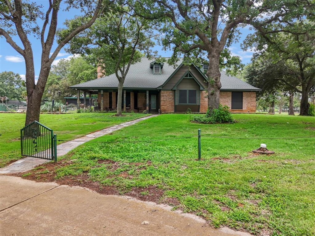 Welcome to this fully fenced in out of city limits home with multiple shops and storage buildings, prepared for Agriculture usage.  Offers two electric gates one coming from East Renfro and one electric private gate coming from Ryan Avenue.  This home offers ADA Accessibility for the two story Guest Quarters.  Guest Home offers a large deck that has a gorgeous view to property.  Home has been extremely well maintained and has so much to offer for possible Commercial use and for residential use with a large pool to cool off in.  Home has had horses in the past.  Grass and trees are well maintained throughout property.  There are three wells on property with low electricity and water bills.  Home is absolutely stunning with 3 bedrooms and 2 full baths.  The kitchen is ready for entertaining along with eat in kitchen, breakfast bar along with two convection ovens.  Garage has been converted to a game room with amazing carpet to boast.  You will not want to miss this dream home with an abundance of opportunities for family growth, relaxation, and entertainment.  For more information please contact Agent for more information and details.  A must to see to believe!