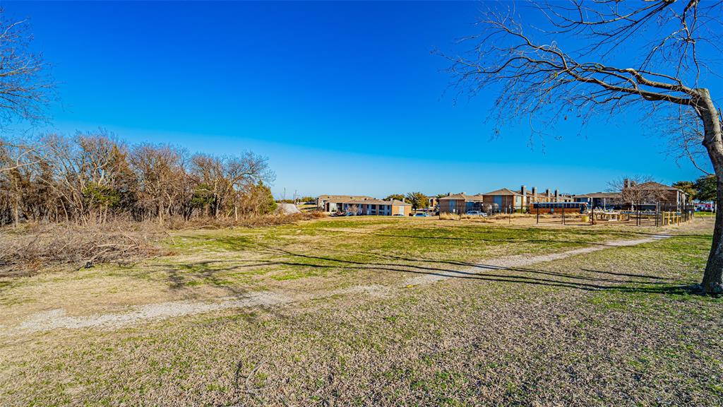 6.8 Acres Prime Commercial Development Opportunity- THOUSANDS OF CARS DRIVE BY DAILY! 

Ready for new commercial development, this 6.8-acre property is ideally situated just minutes from I-30 and I-820, conveniently located just past a busy four-way intersection. The large parcel offers ample space for significant retail or business ventures with plenty of room for extensive parking and easy access.

Potential uses include a tractor supply store, large grocery retail, business park, retail shopping center, or medical plaza. Self-storage units are not permitted by city ordinance.

Located in a rapidly growing area surrounded by established neighborhoods, popular baseball fields, parks, and both private and public schools, this property benefits from heavy drive-by traffic and a growing population needing convenient services. A neighborhood grocery store would be particularly well-positioned here.

The city’s planning staff is known for being highly cooperative and knowledgeable, providing excellent support to prospective developers. The region is experiencing significant growth, with many companies relocating to Texas — including a major high-tech firm that recently signed a lease on a million-square-foot facility just minutes away.

Surrounded by some of North Texas’s top-producing businesses, this site is perfectly positioned for success. Build your venture here and tap into the dynamic and expanding local economy!