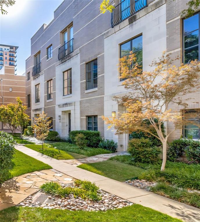 Exceptional 3-story home in the heart of Uptown only 1 block from the Katy Trail delivers the perfect mix of style, space and outdoor living. Two brand-new Carrier HVAC systems installed May 15, 2026. New tankless water heater installed for efficiency and long-term savings, plus complete replacement of Juliet balcony doors and windows. Fully updated garage system too. Home warranty included. Built in 2006, the 2 bedroom 3 bath home includes a bonus room, ideal for home office. This home gives you true breathing room with over 2300 sqft paired with soaring 11-foot-high ceilings. Rich chocolate cabinetry and quartz countertops throughout set the tone for elevated living. The open-concept with hardwood floors creates a seamless flow between the kitchen, dining and living area, perfect for entertaining. Kitchen is a showstopper with oversized cabinets, large island, stainless steel appliances and walk-in pantry. Living area includes built-in entertainment nook, wine bar & wine fridge, adding a touch of luxury to your everyday. Spacious primary suite has Juliet balcony, sitting area, large spa-inspired bathroom with dual undermount sinks, oversized mirror, jacuzzi tub, separate glass shower, water closet and walk-in closet. Full-sized washer & dryer area located on same floor. Second bedroom has full bath—ideal for guests. Private 4th floor rooftop deck invites you to enjoy sunsets, starlit evenings and unforgettable gatherings with room to mount a flat-screen TV, hang string lights—it’s your personal open-air lounge. Additional highlights; attached 2-car garage, access to resort-style pool with waterfall—all tucked into a quiet residential enclave yet surrounded by the energy, elegance and connection that only Uptown can offer. Prime location with trolley 1 block away providing car-free access to everything the area offers. West Village, Whole Foods, Trader Joe's, tennis & pickle ball courts close by. You’re not just purchasing a property, you’re claiming a lifestyle.