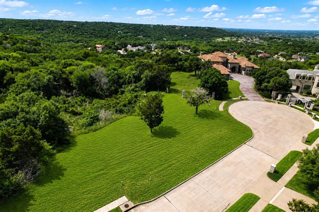 Rare opportunity to own the last available lot in the exclusive gated Views of Lake Ridge community. Situated on a prestigious cul-de-sac and surrounded by stunning custom estates, this 1-acre homesite offers exceptional privacy, breathtaking surroundings, and the perfect setting to build your dream home.

This build-ready property is fully equipped with city water, sewer, electricity, underground utilities, and completed streets already in place. Even better, the sale includes a survey, topography report, soil test, grading plan, architectural plans and renderings, and a thoughtfully designed 3-story home —saving you significant time and upfront development costs.

Ideally located just minutes from Joe Pool Lake, Tangle Ridge Golf Club, and scenic hiking and biking trails, with convenient access to Dallas, Fort Worth, DFW Airport, and Arlington’s premier dining, shopping, and entertainment.

Don’t miss this rare chance to build in one of Cedar Hill’s most prestigious gated communities.