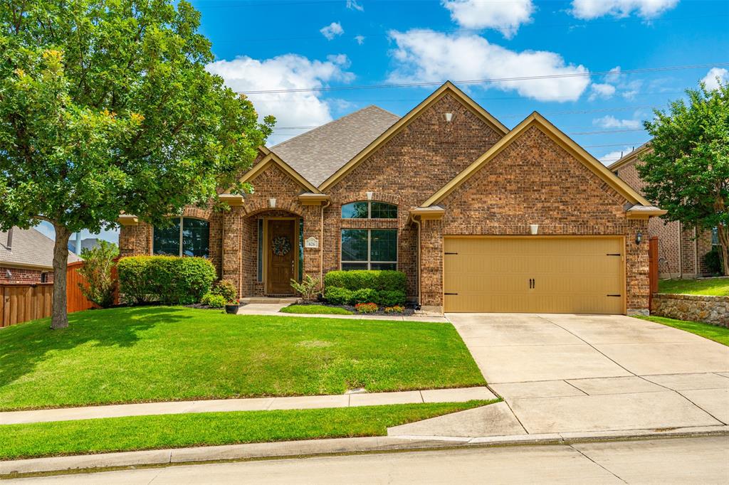 Welcome home to this beautifully designed residence that offers the perfect balance of open-concept living, private retreats, and exceptional community amenities. Located just minutes from the restaurants, boutiques, and small-town charm of Roanoke, this home combines convenience with comfort in all the right ways. A dramatic two-story foyer creates a grand first impression, flanked by a formal dining room and a versatile flex space that can easily serve as a private home office, study, playroom, or hobby room. Beyond the entry, soaring ceilings, elegant archways, and walls of windows fill the home with natural light and create an inviting atmosphere throughout. The spacious family room centers around a cozy fireplace and flows seamlessly into the chef-inspired kitchen, making entertaining effortless. Featuring granite countertops, a gas cooktop, abundant cabinetry, generous prep space, a breakfast bar, and an adjacent dining area, this kitchen is designed to be the heart of the home. The thoughtfully designed floor plan offers a private primary retreat on the main level, complete with dual vanities, a relaxing garden tub, separate shower, and a large walk-in closet. Two additional bedrooms are tucked away in their own downstairs wing, providing privacy and flexibility for family or guests. Upstairs, you'll discover a whole new level of living with a spacious game room and dedicated media room—perfect for movie marathons, game-day gatherings, gaming, or simply giving everyone their own space to relax and unwind. 
Step outside to a large covered patio overlooking a spacious backyard, ideal for outdoor dining, entertaining, or enjoying peaceful evenings under the Texas sky. A private gate provides direct access to community walking trails and greenbelt areas, extending your backyard experience beyond the fence line. Residents enjoy an impressive collection of neighborhood amenities including a resort-style pool, splash pad, playgrounds, jogging and hiking trails.