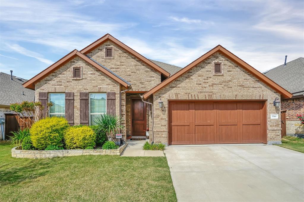 Welcome to this gorgeous neighborhood! Terrific 3 bedroom and 2.5 bath home with a 2 car garage. This is a beautiful David Weekly Kepley Model home. The kitchen boasts generous counter space and a breakfast bar, making cooking and entertaining a delight. Picture evenings by the fireplace and mornings having coffee out on the patio in the backyard. The main bedroom boasts a private ensuite with a walk-in closet. Other bedrooms offer plush carpet, ceiling fans, and sizable closets. Relax with your favorite drink in the fenced in backyard with a patio, lush grass, and great opportunity for adding personal touches. Don't miss this incredible opportunity.