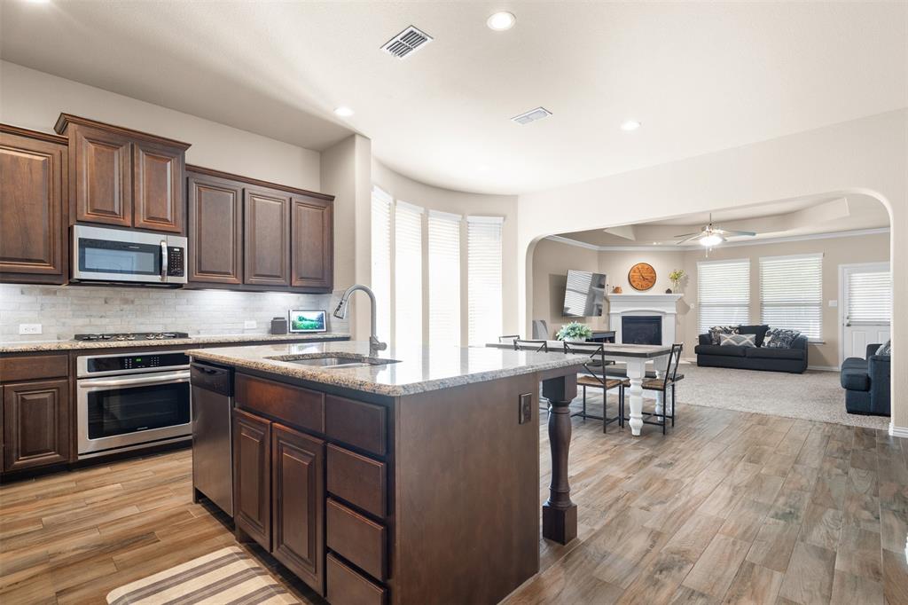 Welcome to your home in Teasley Trails subdivision. Ideally located minutes from dining, shopping, and entertainment. Your soon to be home greets you with a warm, cozy feeling and a spacious layout you’ll love. Sunlight pours into the main living areas throughout the day, creating a warm, uplifting atmosphere that makes the entire space feel open and alive. The open-concept design seamlessly connects the kitchen, dining, and living areas, making the home perfect for entertaining or simply enjoying everyday life. The kitchen offering an abundance of cabinet space, counter space, and a gas cook top. The huge master bedroom is a true retreat, offering space for a sitting area and split from the secondary bedrooms for extra privacy. Each secondary bedroom is generously sized, providing comfort and flexibility. The huge office is large enough to function as a professional workspace, studio, or multipurpose room. A convenient half bath sits close by, adding practicality for long workdays or guests. Community pool is conveniently located 2 minutes from the house.