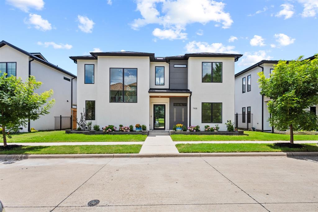 Modern luxury redefined in the prestigious Settlement at Craig Ranch community. This 2022 custom built masterpiece
commands attention from the street with a striking white stucco facade, black metal roof, and a dramatic front window wall
two soaring 48,120 picture windows revealing a spiraling chandelier and floating glass railed staircase within. A grand
48-inch wrought iron and glass entry door welcomes you into soaring ceilings, 50+ oversized windows providing ample
natural light, and 8-inch baseboards.The two-story linear gas fireplace with LED lighting and decorative stone anchors the main living space, where a 16-foot glass slider opens directly to the private, pool-ready courtyard. The chef's kitchen is a true showpiece, featuring a 48 inch JennAir professional gas range with griddle, custom tiled range hood with Zephyr insert, panel ready JennAir refrigerator and dishwasher with matching cabinetry, a JennAir drawer microwave in the island, dual pot fillers, and a 45 inch Kraus workstation sink with reverse osmosis filtration. All set beneath Taj Mahal quartzite countertops. he main level primary suite is a private retreat.Upstairs, the game room offers its own custom dry bar with designer backsplash tile and a 16 foot glass slider opening to an oversized 530 SF covered balcony connected by an outdoor staircase to the 198 SF covered patio below, both finished with tile flooring and pine tongue and groove ceilings. A fully finished bonus room with hardwood floors, windows, and a private lockable door offers flexibility as a 5th bedroom. Every Bedroom has  White Macaubas quartzite countertops, frameless glass doors, and Kohler fixtures. Upgrades include a whole home AquaSana water filtration system with dual reverse osmosis units, dual tankless water heaters, app-controlled smart security locks.This home delivers architectural drama, premium craftsmanship, and effortless indoor outdoor living in one of McKinney most sought-after communities.