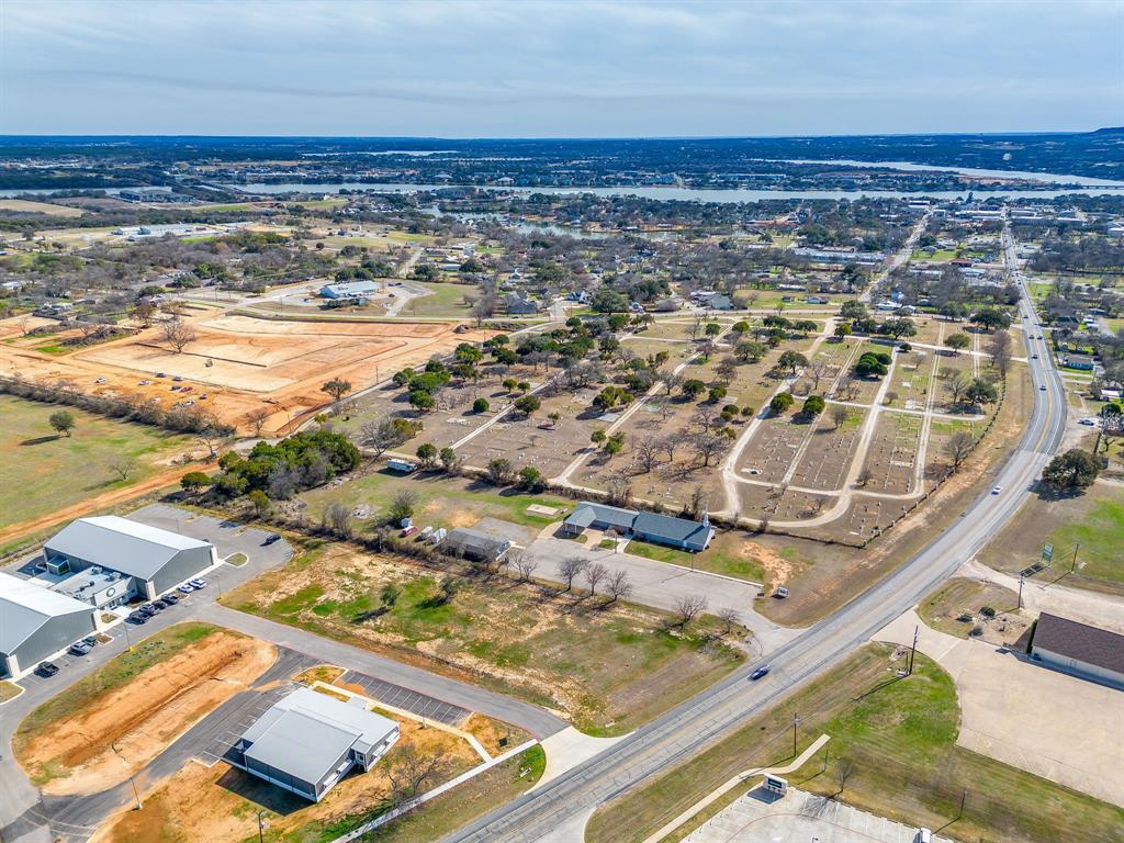 Ideal location on Weatherford Highway just minutes from the historic Granbury Town Square. This property offers excellent visibility and convenient access in a well-established area. Previously used as a church, the building layout lends itself to a variety of potential uses, including office space, medical or professional clinic, private or Christian school, daycare, or similar community-oriented operations (buyer to verify zoning and permitted uses).
The combination of location, accessibility, and adaptable space makes this a strong opportunity for owner-users or investors seeking a versatile property in the Granbury market.
This 2.7 acre tract of land has multiple additional building sites for commercial development.