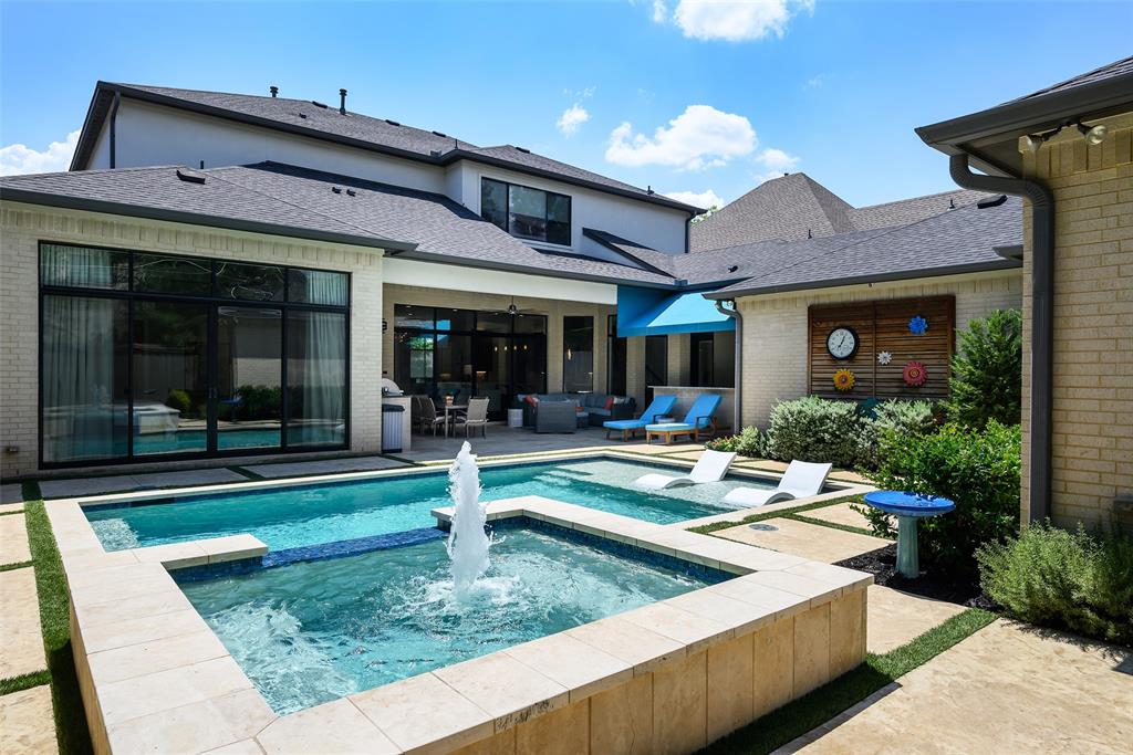 Stunning and move-in ready, this 2015 home built by Williamsburg Custom Homes in coveted Preston Hollow blends soft contemporary design with warm transitional touches. Meticulously maintained with a freshly painted interior, this 5 bedroom home includes both the primary and guest suites on the 1st floor plus a private study; the layout is ideal for modern living. The open-concept with 12' ceilings in the kitchen flows seamlessly into the family and breakfast rooms, all overlooking the backyard oasis. A large walk-in pantry adds extra convenience. Upstairs, you’ll find three spacious en-suite bedrooms with 10' ceilings, a generous game room, and a dedicated media room which is currently being used as a second study. The backyard is built for entertaining with a covered patio, outdoor kitchen, sparkling pool, and a turfed grass area perfect for play or pets. A 3-car garage completes this thoughtfully designed home in one of Dallas’s most coveted neighborhoods. Perfectly located within a short distance from Preston Hollow and Park Cities' finest shopping and restaurants and easily accessible to all major highways and airports, this is the perfect location to call home.