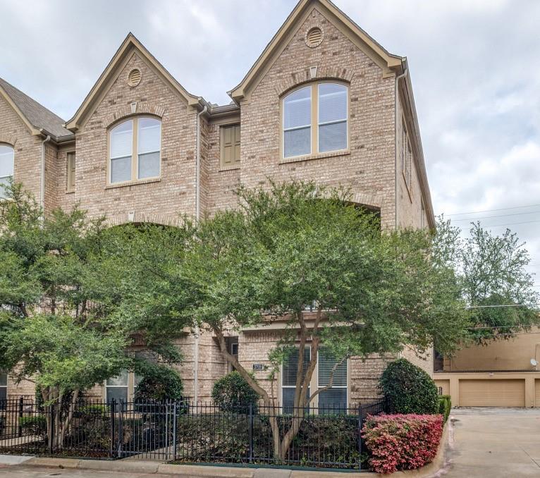 Quiet corner townhouse in the heart of Oak Lawn that is tucked into a private interior position off Wycliff and set back from the street with a private front courtyard and balcony. Built in 2006 and meticulously maintained, this 2 bedroom, 2.5-bath end unit residence lives like a single-family home with three full stories, a private 2 car attached garage, abundant natural light from the end unit exposure, and private outdoor space for pets or entertaining. 
All major systems have recently been replaced including new roof in 2025, new multi-zone HVAC in 2024 and tankless water heater in 2021. The first floor features a garage with private access plus a full bath and guest bedroom that can work as a private office or 2nd living area!  On the 2nd floor, you will find a a gourmet kitchen with sleek black granite counters, wine cooler, stainless appliances with refrigerator that stays, and a bar area with extra seating that is perfect for entertaining. The open concept floor plan seamlessly flows into the sunlit dining area with wall of windows, and a large great room anchored by the fireplace and a walk out covered balcony that extends the outdoor living space.  The entire third level is dedicated to the expansive primary suite that features a large sitting area, walls of windows overlooking the lush treetops and spacious bath with jetted soaking tub, oversized shower, and a large walk-in closet. 
The house has a amazing walk score of 85 with easy walking access to shopping and dining in Oaklawn and Cedar Springs. Enjoy jogging through the Highland Park neighborhoods or to the Katy Trail to be even more connected to multiple areas. Uptown and Downtown Dallas are a short drive away as well as endless shopping, dining, entertainment and more! . Move-in ready with immediate availability.