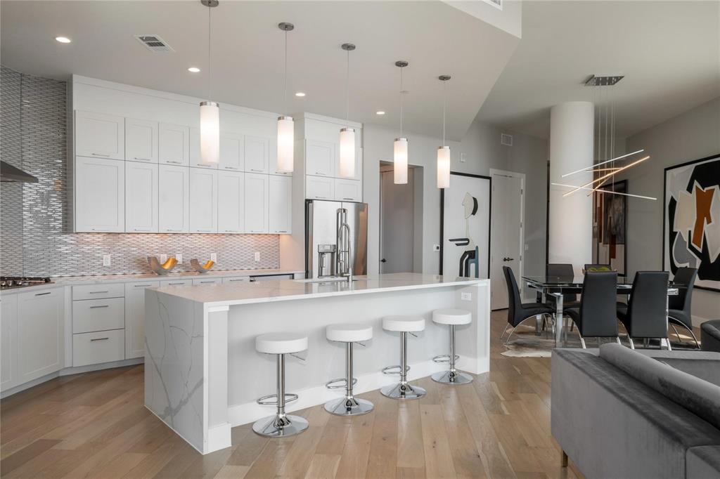 Upscale boutique luxury penthouse in Knox Henderson with Amazing Views!!Property amenities include 24 hr concierge, onsite maintenance & management,pet park and pet washing station, rooftop heated pool,expansive fitness center with yoga studios,bike storage &repair room,outdoor kitchens. This home features upscale amenities including floor to ceiling windows, high ceilings,stainless appliances, wet bar, built in desk, large master bedroom with huge spa inspired bathroom and 2 spacious walk-in closet.Abundance of natural light! Expansive private balcony the length of the unit. Unreserved secure parking garage $75 per mo, reserved parking $150 per mo. Private garage parking available $250 per mo. Special- two weeks free on a 12+ lease term minimum.