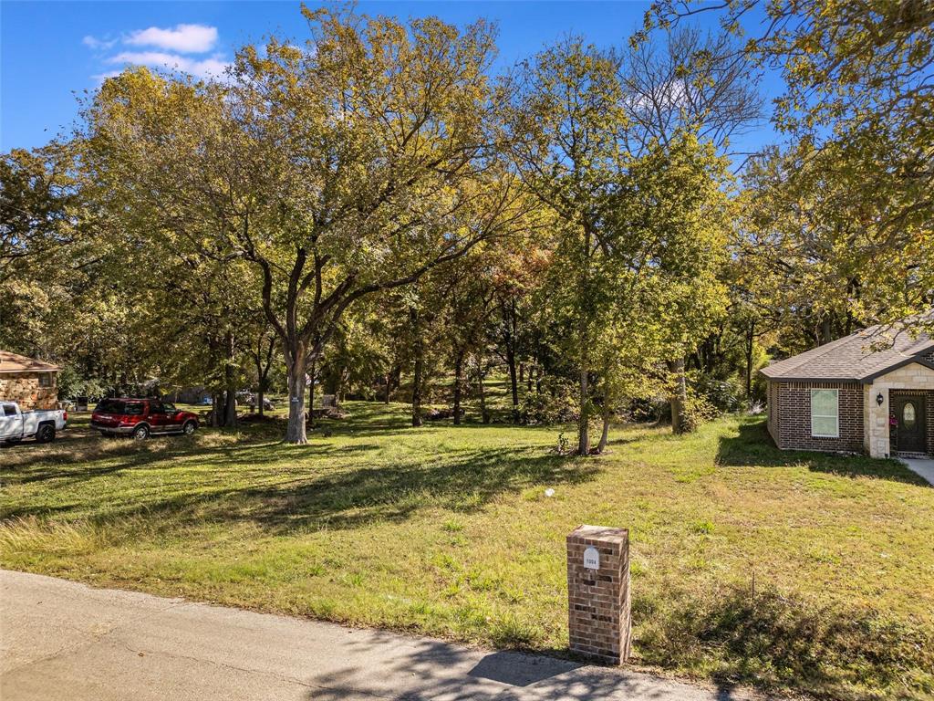 Come build your custom home on this .52 acre-lot with mature trees and utilities. Choose to build a modern, or country home. The elongated lot will allow you to build your home and add additional buildings such as a workshop ect.  Some agriculture allowed, verify with City of Seagoville zoning.

 Minutes away from downtown Dallas, Schools are in DISD. Survey available. Only 1 Lot for sale. Moore St and 2nd lot not for sale, but may be negotiable. Survey Available Please see Offer Instructions under transaction desk