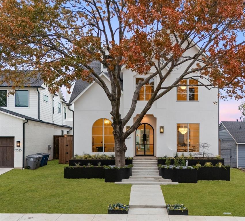 Stunning California Modern home located in the heart of Lakewood, just steps from White Rock Lake and premier hiking-biking trails. This luxury residence features 4 bedrooms, 4 full bathrooms, and 2 half bathrooms with a sophisticated stucco exterior and warm modern design elements throughout. The open-concept floor plan showcases wide-plank white oak floors, custom cabinetry, and high-end appliances. The spacious downstairs master suite offers a serene retreat with spa-inspired finishes and generous closet space.

A gourmet kitchen opens to the main living and dining areas, creating an ideal setting for daily living and entertaining. Home is fully wired for a security system and AV integration. Large windows bring in abundant natural light and frame views of the backyard oasis featuring a sleek pool and expansive covered back porch.

Located within walking distance to White Rock Lake, trails, parks, and zoned to highly sought-after Lakewood Elementary.