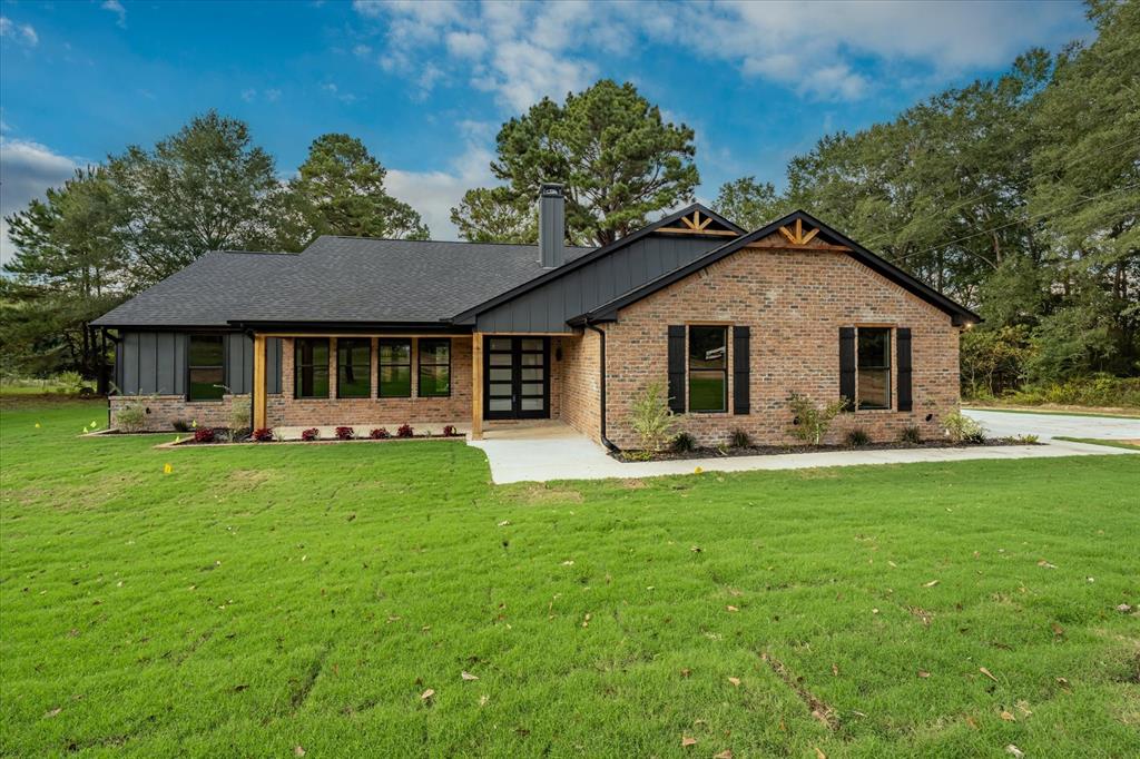 Welcome to your dream home in the heart of East Texas! This sleek new construction offers the blend of luxury, privacy, and wide-open space with 4 spacious bedrooms, 3 full bathrooms, and 2.02 acres of scenic countryside views—all with no HOA restrictions in Bullard ISD. Thoughtfully designed with modern living in mind, this home features an open-concept layout, high ceilings, and large windows that flood the space with natural light. The gourmet kitchen has custom cabinetry, a large island, and sleek finishes, opening up to a warm and inviting living area—ideal for entertaining or quiet evenings at home. The primary suite is a peaceful retreat with a spa-like bathroom, double vanities, a soaking tub, and an oversized walk-in shower (84 sq ft). Three additional bedrooms offer flexibility for family, guests, or a home office setup. Step outside to enjoy panoramic views of rolling pastures and endless skies. With over 2 acres, there’s plenty of room to build a shop, add a pool, or simply enjoy the tranquility of country living—just minutes from Bullard ISD schools, shopping, and Lake Palestine. Don’t miss this rare opportunity to own a brand-new home on acreage with no HOA. Your Texas lifestyle awaits!