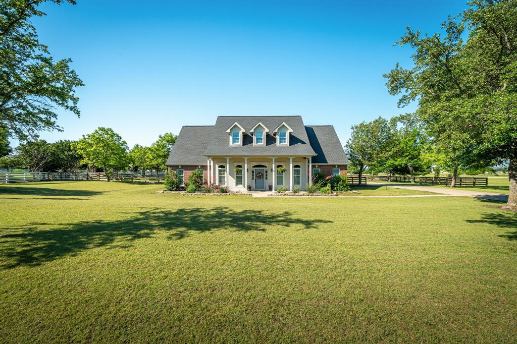 Experience the premium acreage lifestyle in the prestigious private gated community of Country Ridge. 1.64 ACRES gives you endless possibilities! As you enter the home, you are welcomed by a large living rm with a wood burning fireplace, a formal dining rm & a large office with a storage closet. Engineered hardwood floors carry you through-out the entire home. Large private kitchen with a large butcher block island, walk-in pantry, coffee bar, gas range with air fryer -convection & breakfast nook. Retreat to your large Primary bedroom with a en-suite bath featuring a large shower, jetted tub, double sinks, quartz counters and his-and-her's closets. Enjoy a beverage on the newly screened-in porch which you can access from the Primary and living rm. The downstairs bdrm featuring a murphy bed, a walk-in closet and quick access to a large full bath is perfect for guests, a nursery or as a mother-in-law suite. Head upstairs where you will find 3 bedrooms with ample closet space as well as a full bath with double vanities. The flex-space upstairs can be used as a playroom, study area or work-out room and has a large storage closet. Oversized 2 car garage has large side area with a storage closet. Enjoy the expansive patio overlooking the peaceful backyard featuring a firepit, wood rail fence with a gate and a herb garden. The plantation shutters through-out the entire home are the icing on the cake. Tons of flexibility with this home. Add a workshop or extra garage. Home is wired for a generator that can stay with the home. Country Ridge is a great community that has many activities for all to enjoy.

*****Information deemed reliable but not guaranteed. Listing broker and MLS make no warranties as to accuracy of information, including but not limited to measurements, schools, HOA, taxes, utilities, condition, or features. 2 hot water heaters (garage and upstairs attic closet in back bedroom)