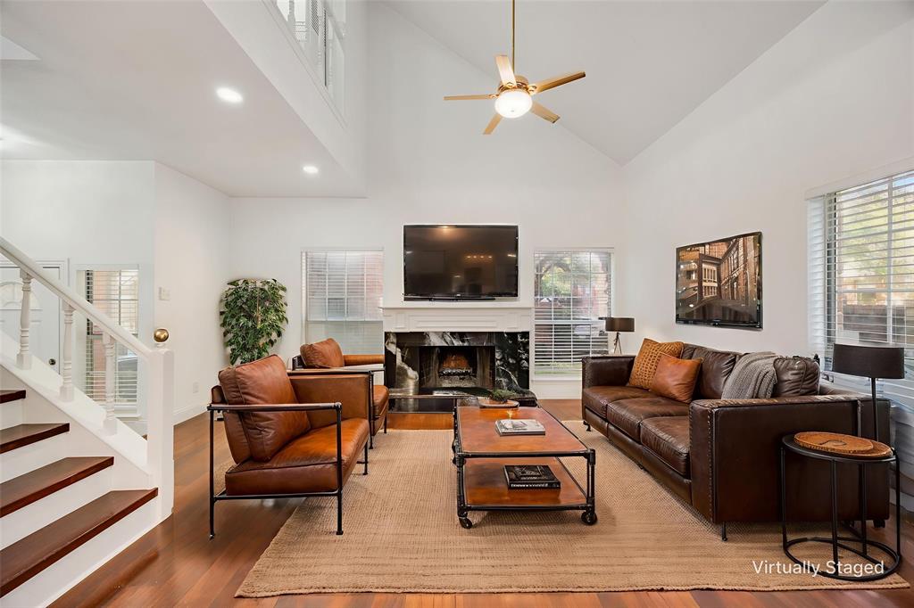 In Far North Dallas, this updated condo stands out with more than $30,000 in upgrades, modern finishes throughout, and a serene setting within a serene 22-unit community. The home offers a polished, thoughtfully designed living experience with features that help streamline day-to-day living.
Inside, high ceilings and abundant natural light create an open, welcoming feel. Stylish, low-maintenance flooring runs throughout the home, no carpet anywhere, and a cozy fireplace anchors the living room. A breakfast bar connects the dining area to the renovated kitchen, which features new countertops and backsplash for a clean, modern look. A convenient first-floor half bath adds practicality for guests. The living area opens through double doors to a private, fenced patio, an ideal extension of the living space for morning coffee, evening relaxation, or hosting friends. Just across the way, the community pool provides an additional amenity for everyday enjoyment. Upstairs, both bedrooms function as private retreats, each offering a large closet and direct access to its own bathroom. Fresh paint, recessed lighting, and a spacious utility closet complete the move-in-ready interior. The location adds exceptional convenience: premier shopping and dining are minutes away, and both the Dallas North Tollway and President George Bush Turnpike are approximately half a mile. A rare opportunity in Quail Ridge and currently the only home available for sale in the community. Don’t miss it.