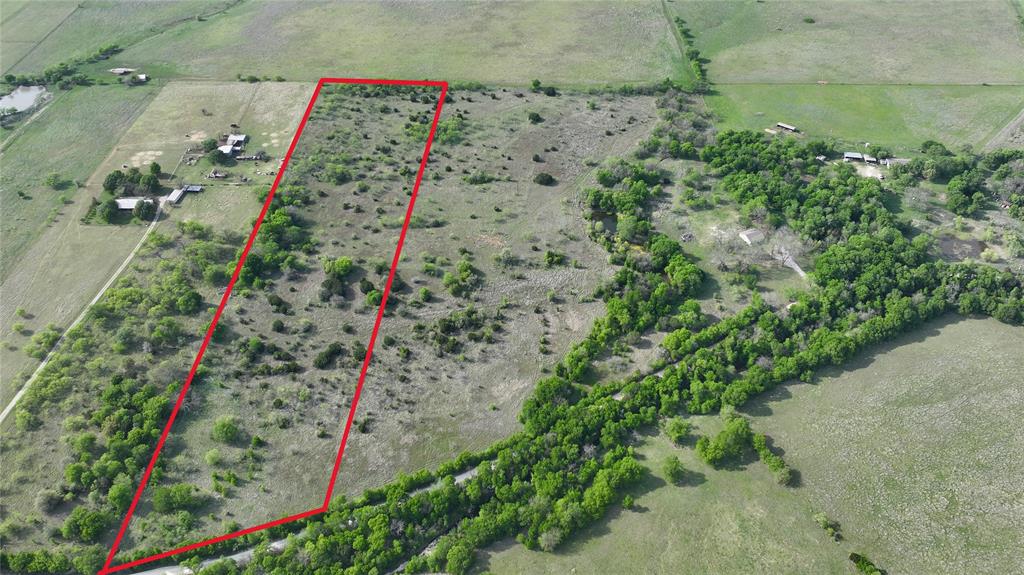 Discover the perfect blend of open space and natural beauty with this 12 acre tract of pastureland. Scattered with mature trees, this property offers both shade and character while remaining ideal for agricultural use or building your dream home. No city taxes and ag exemption already in place, you’ll benefit from reduced property taxes. This is an excellent opportunity for those seeking country living with long-term savings. The land is well-suited for livestock, or a custom homesite with plenty of room to spread out. Located within Blum ISD. Don’t miss your chance to own a versatile piece of Texas land with endless potential. Boundary lines are approximate a new survey will be needed. Other tracts are available, contact a realtor for details and to schedule a showing you cannot access the gate to the property without a realtor.