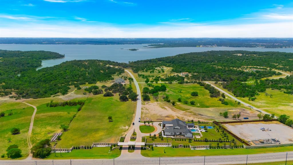 Welcome to Fleming Pointe – A Private Retreat of Natural Beauty and Luxury Living on Waterfront Lot!

Nestled among rolling hills, mature trees, and breathtaking views, Fleming Pointe is a premier gated community offering an unparalleled lifestyle of tranquility and exclusivity. Each spacious homesite provides the perfect canvas for your custom dream home, with the freedom to choose your own builder—subject to approval to preserve the architectural integrity and charm of the neighborhood.

This scenic enclave is more than just a place to live—it’s a sanctuary. Residents will enjoy access to a private, residents-only beach complete with shade structures, a floating dock, and a picnic area—perfect for peaceful retreats or gathering with neighbors. With its blend of natural beauty, privacy, and luxury, Fleming Pointe is where your vision of home truly comes to life.