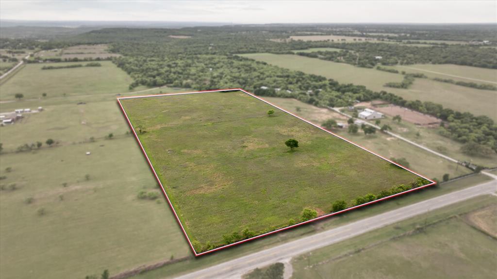 Here it is! 15.01 Acres on FM 1195, also known as Airport Rd, with WATER METER IN PLACE! Ag Exempt! No Restrictions! Properties like this are hard to find, and this one is ready to go! This 15.01± acre tract is a standout for horse owners and anyone looking for usable land with real value. Let’s talk about what matters most out here, water! Sturdivant WSC meter is in and ready to go, which is a huge advantage in this area and saves you time, money, and uncertainty. That alone puts this property ahead of the rest. The land is ag exempt and unrestricted, giving you the freedom to build exactly what you want, barn, arena, stalls, or your full dream horse setup. Whether you're hauling, training, or just want your horses at home, this property is built for that lifestyle. Open and usable acreage provides plenty of room for grazing, riding, and future improvements. Ideal for horses, livestock, or FFA and 4H projects, bring your animals and make it your own. Minutes to town. Mineral Wells ISD. This kind of flexibility is getting harder to find, don’t miss your chance to lock this one down.